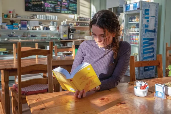 Person peacefully studying Buddhist teachings and the works of Ven Geshe Kelsang Gyatso