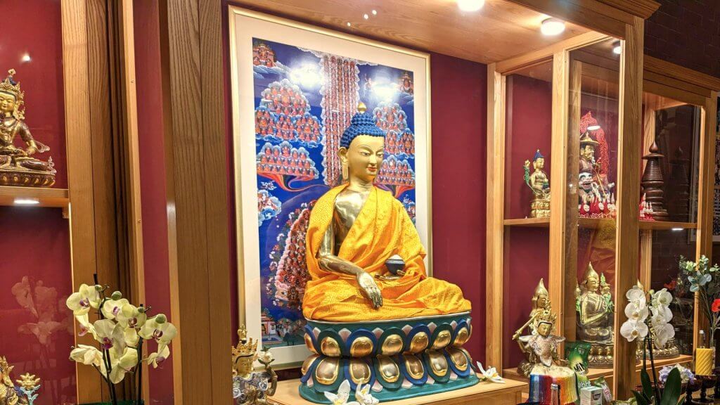 Buddhist shrine and statues in the meditation room at Vajrapani Kadampa Meditation Centre