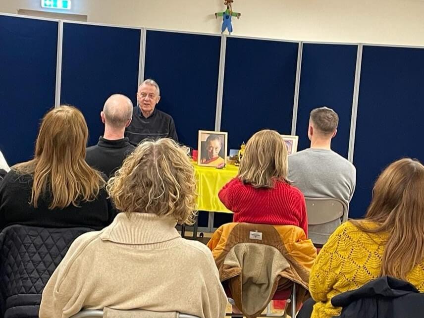 a mixed group of people listening to a talk on Buddhism and Meditation at a meditation class in Denby-Dale Library